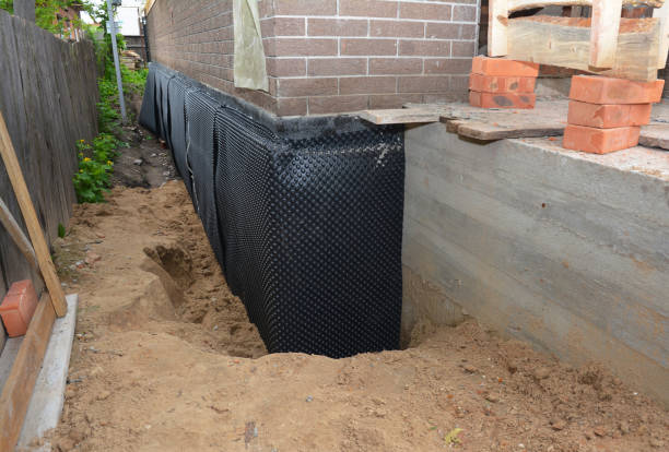 SJ Waterproofing Pros technician performing targeted Foundation Crack Repair assessment in Canaseraga, NY